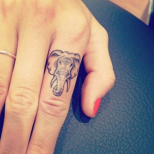 Finger tattoo Tiny Finger tattoo