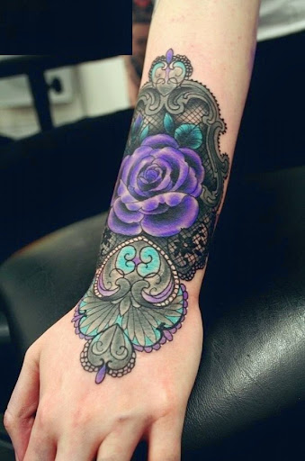 rose tattoos on hand