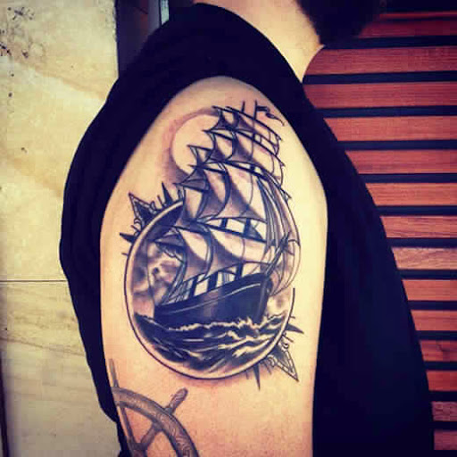 Shoulder tattoos Ship and moon Shoulder tattoo designs