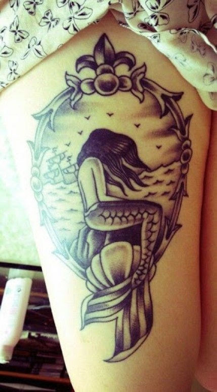 Mermaid Tattoos with flowers