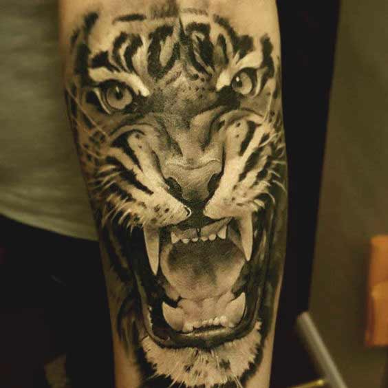 Best Tiger Tattoos For Men And Women Tiger face tattoo on forearm designs for girls