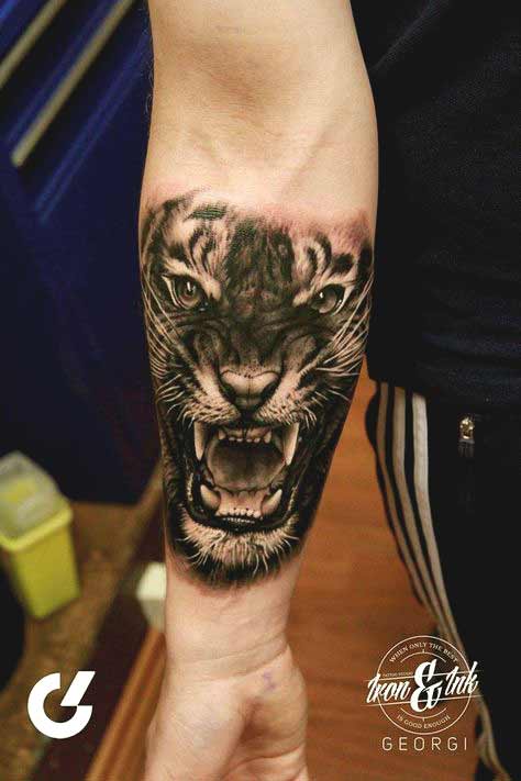 Best Tiger Tattoos For Men And Women Tiger face tattoo on inner forearm designs for men and women