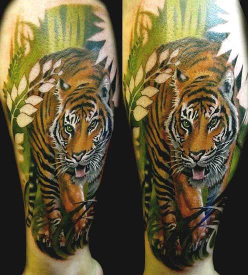Best Tiger Tattoos For Men And Women Tiger tattoo designs on thigh ideas for men and women