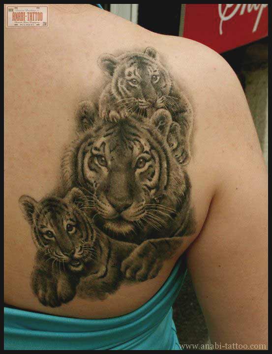 Tiger with cub tattoo design on back ideas for men and women Tiger with cub tattoo design on back ideas for men and women