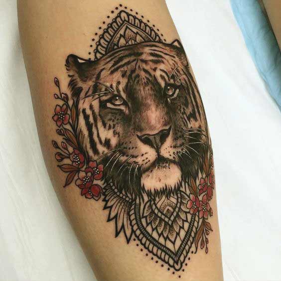 Best Tiger Tattoos For Men And Women Tiger face with mandala flower tattoo on leg ideas for girls
