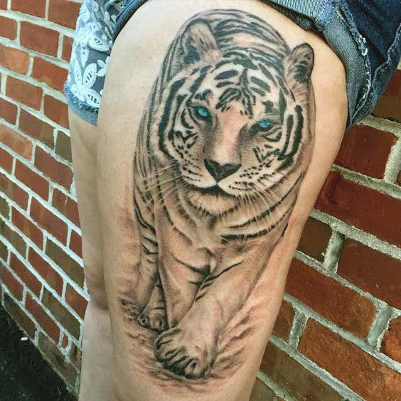 Best Tiger Tattoos For Men And Women White tiger with blue eyes tattoo on thigh ideas for girls