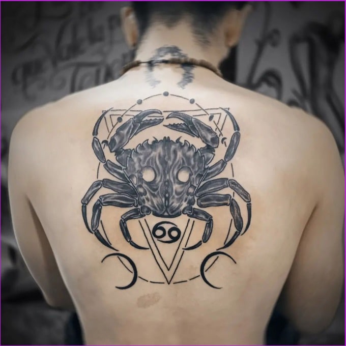 cancer zodiac tattoo on back