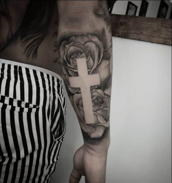 arm cross tattoos