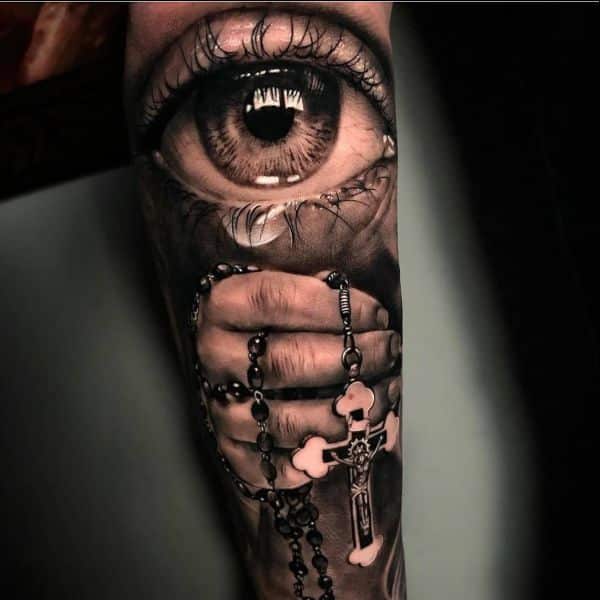 cross tattoos on arms