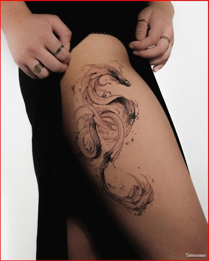 dragon tattoo on thigh