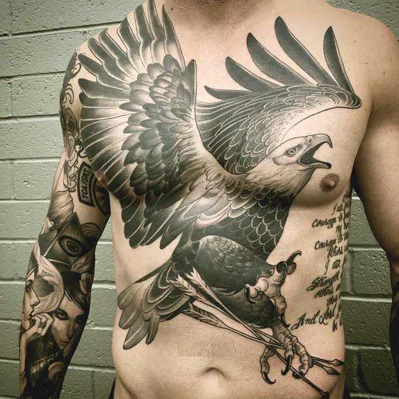 Eagle flying with arrow on chest Eagle flying with arrow on chest tattoo
