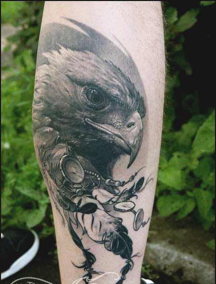Eagle with feather tattoos Eagle with feather tattoos designs on forearm ideas