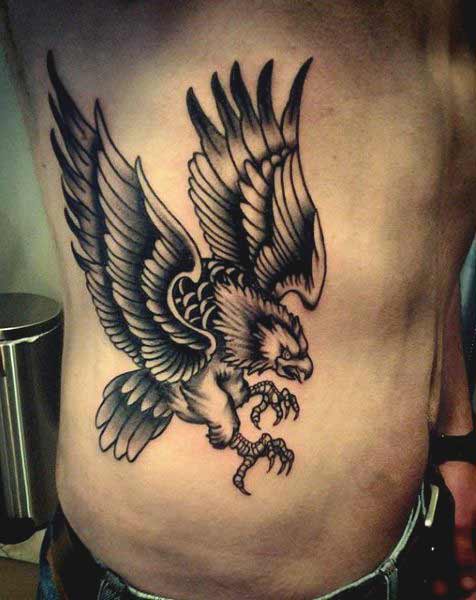 Best eagle tattoo designs for men and women Flying eagle on ribs tattoos