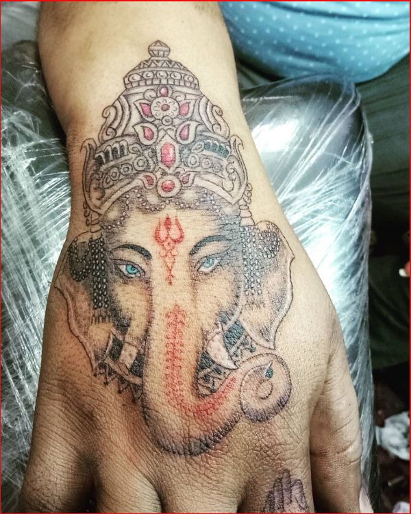 ganesha tattoo on hand
