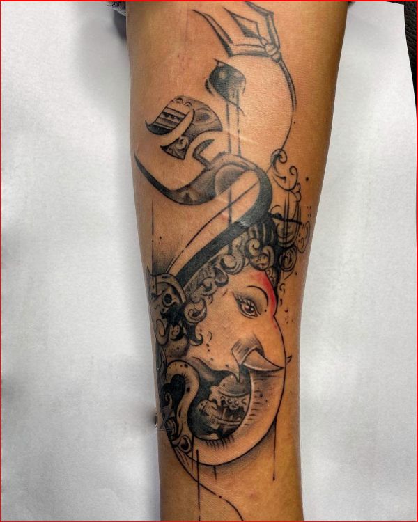 ganesh name tattoo