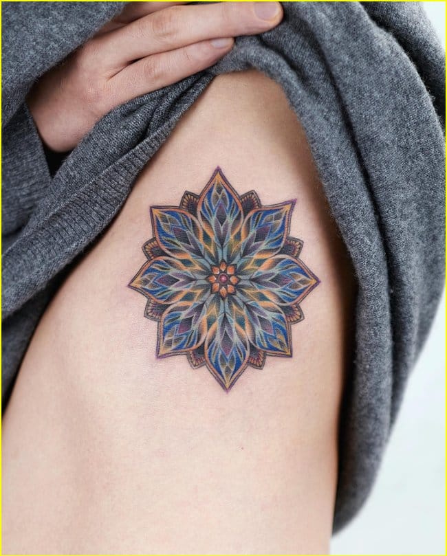 mandala rib tattoos