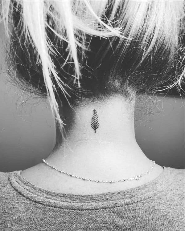 small feather neck tattoos
