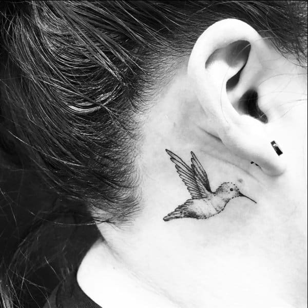 humming bird neck tattoos