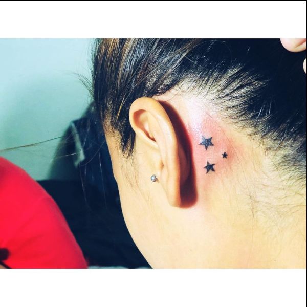 star tattoos behind ears