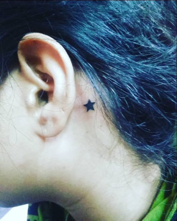star tattoos behind ears