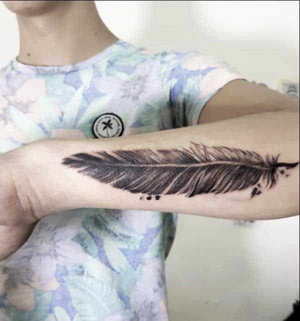 feather tattoos elbow