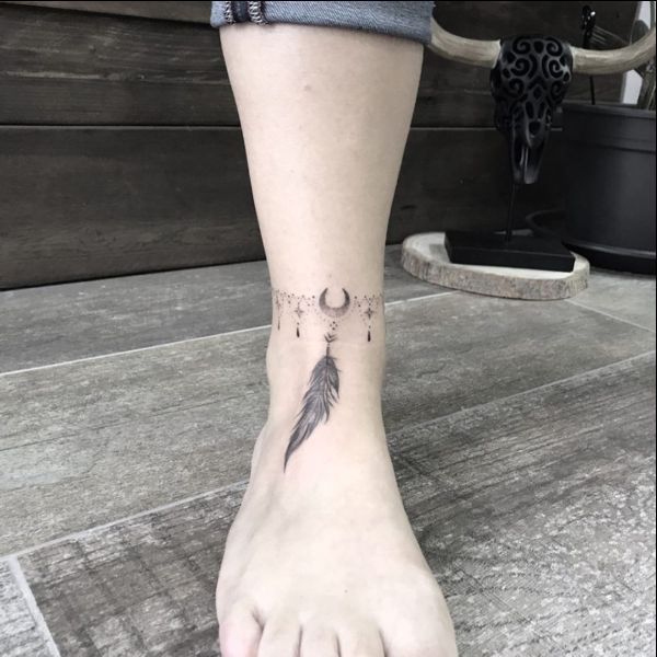 feather ankle tattoos