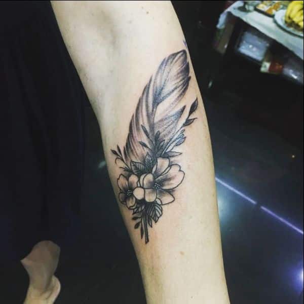 raven feather tattoos