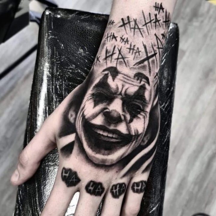 joker hand tattoo