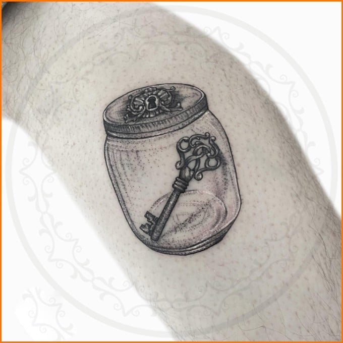 girl lock and key tattoo