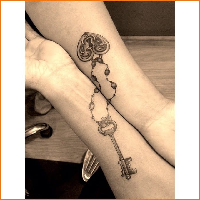 lock and key tattoos bracelet matching on wrist