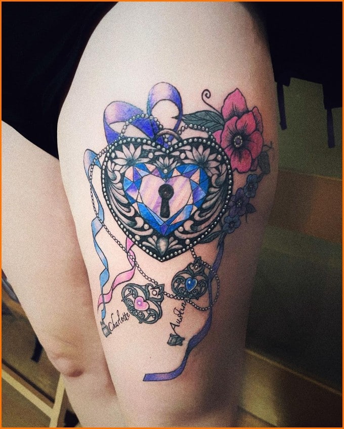 lock and key tattoos on thigh