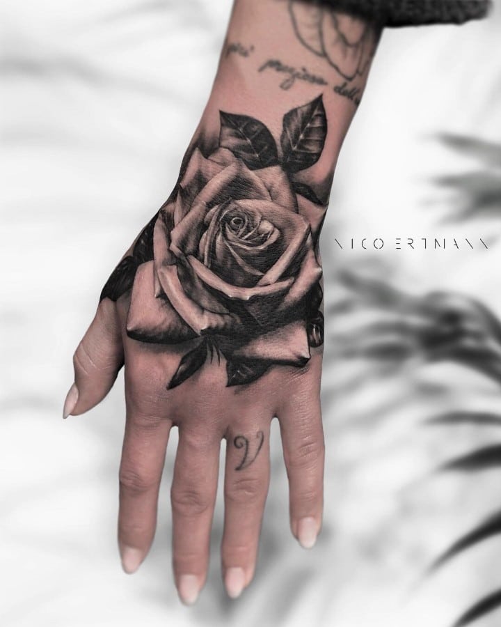 rose hand tattoo