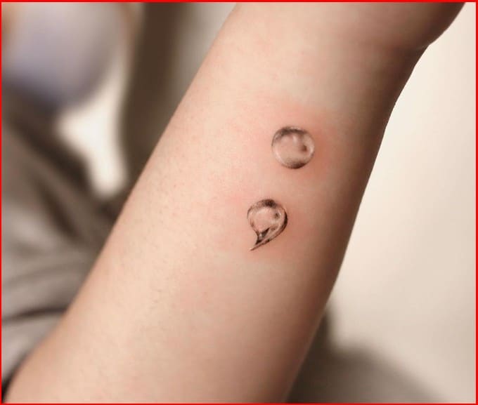 unique minimalist semicolon tattoo