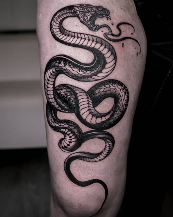 snake leg tattoo