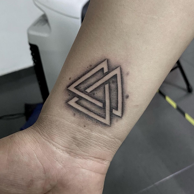 The valknut - Odin's knot tattoo on wrist