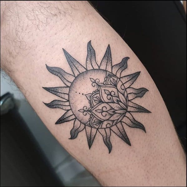 tribal sun tattoo