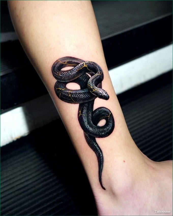 snake leg tattoo